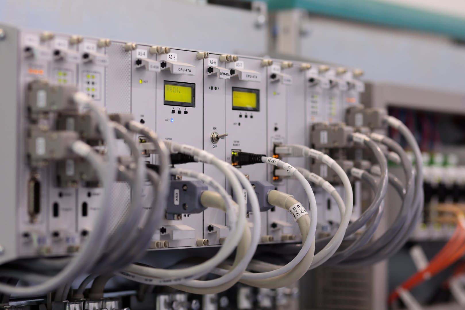 Industrial computer control system mounted in rack. Selective focus.